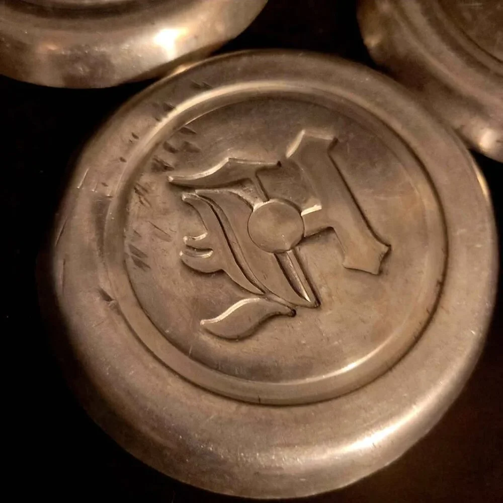 Vintage Aluminum Coasters With An Old English 